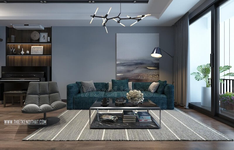 Sofa bọc nỉ với gam màu xanh tươi mát là điểm nhấn cho cả không gian Các xu hướng thiết kế kệ tivi phòng khách đẹp nhất