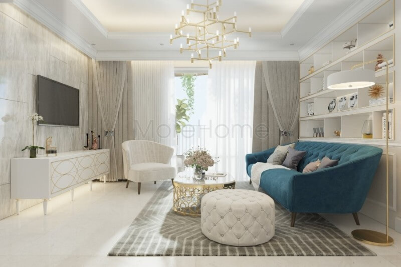 Bộ sofa tân cổ điển bọc nỉ màu xanh ấn tượng được coi là điểm nhấn sang trọng, tạo sự tươi mới cho không gian phòng khách của gia chủ Tham khảo các mẫu thiết kế sofa phòng khách đa phong cách